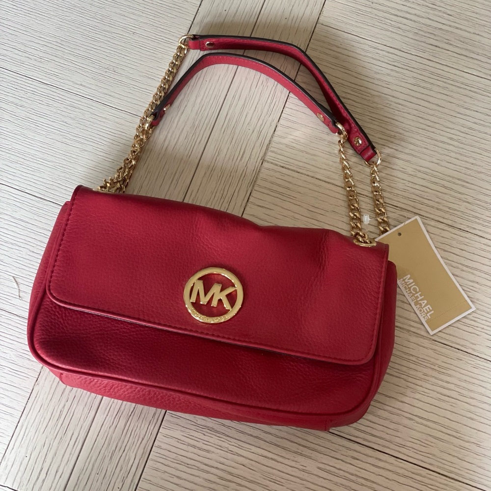 Michael Kors red crossbody or shoulder bag with adjustable strap